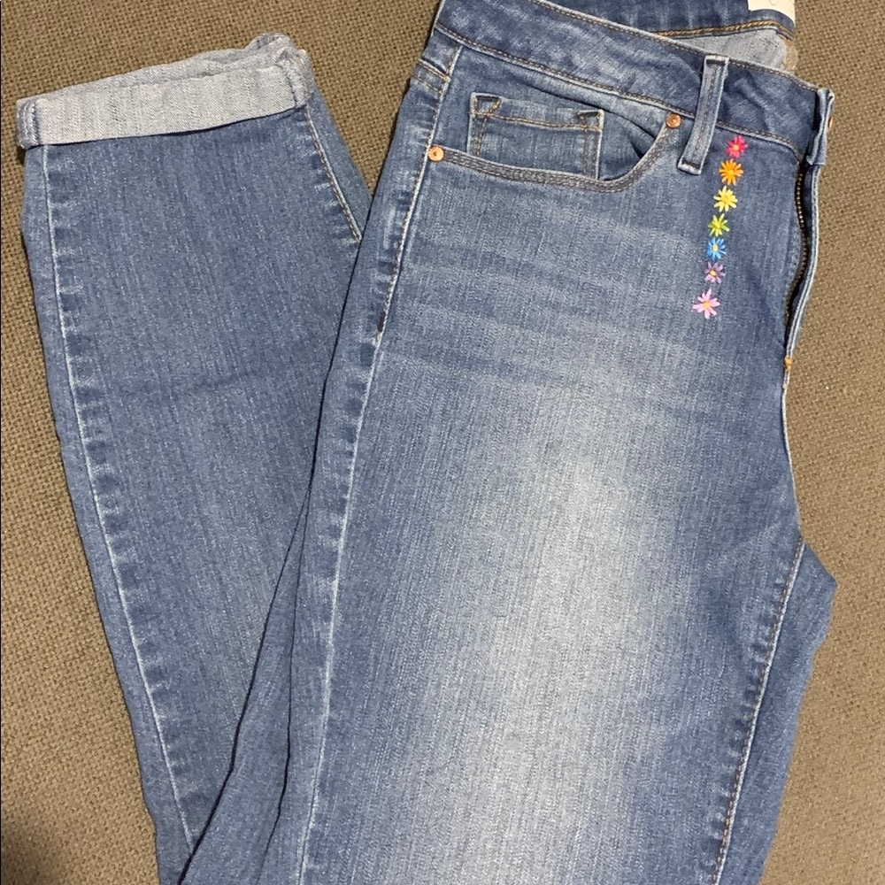 Jeans with cute hand-stitched flowers